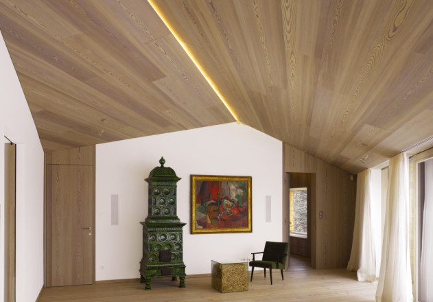 Bembé Dellinger Architekten und Stadtplaner Wohnzimmer mit Kachelofen