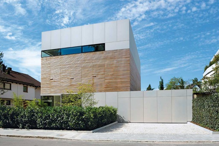 Lynx Architecture weniger ist mehr Modernes Einfamilienhaus 3 Etagen Zwischengeschoss Holz Garage