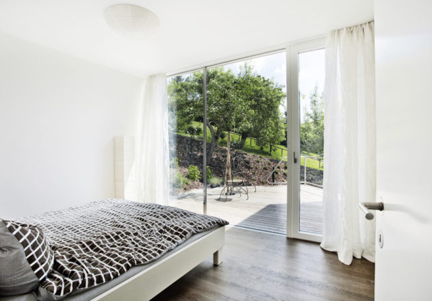 LOVE architecture and urbanism Villa mit Pool Graz Schlafzimmer