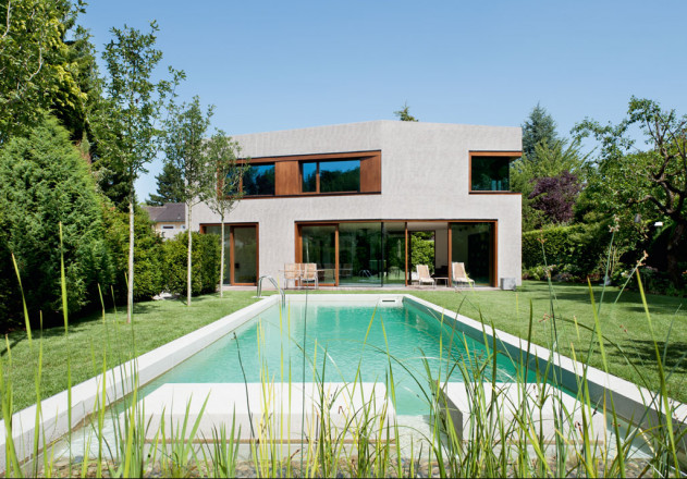 Lynx Architecture Einfamilienhaus gestockter Beton Gartenfassade Pool