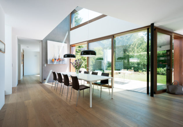 Lynx Architecture Einfamilienhaus gestockter Beton Innenansicht Essbereich Terrasse