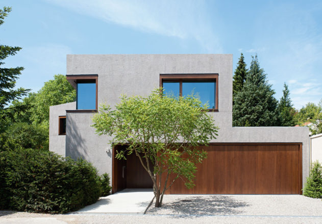 Lynx Architecture Einfamilienhaus gestockter Beton Strassenfassade