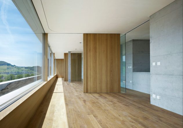 Buchner Bründler Architekten Einfamilienhaus aus Beton Gelterkinden Innenansicht Schiebewände